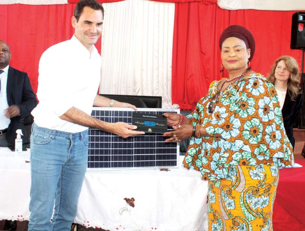 Roger Federer pays visit to Malawi to hand over educational tablets